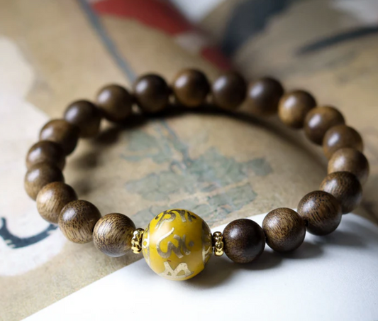 Golden Mantra Wood Bead Bracelet – Wisdom, Balance & Spiritual Power