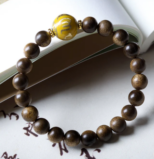 Golden Mantra Wood Bead Bracelet – Wisdom, Balance & Spiritual Power