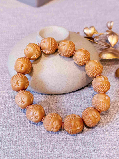 “Silent Faces” Sacred Walnut Bracelet – Hand-Carved Buddha Beads for Peace and Presence